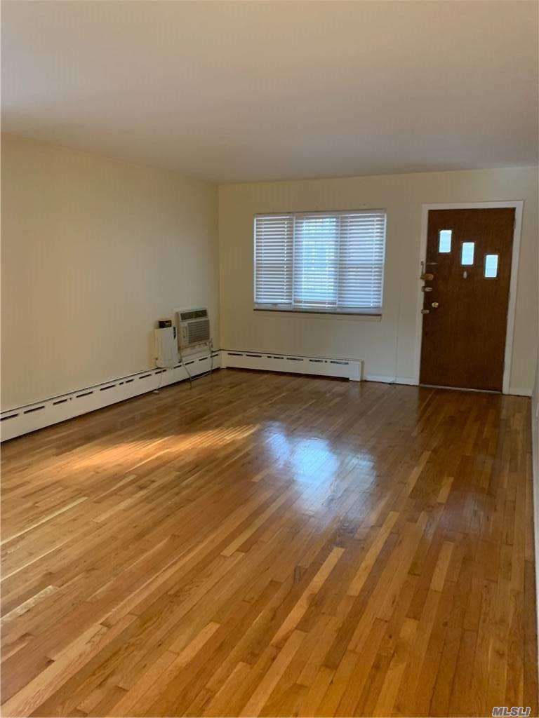 Freshly Painted 2 Bedroom Apartment on the 1st Floor for Rent. Features Living Room, Kitchen and 1 Full Bathroom. Hardwood Flooring Throughout with Tile in Kitchen area and Bathroom. Has Washer/Dryer Hookup Available. Heat and Hot Water is Included. Great Location, Close to Schools & Shops. Near Buses and all Major Highways.