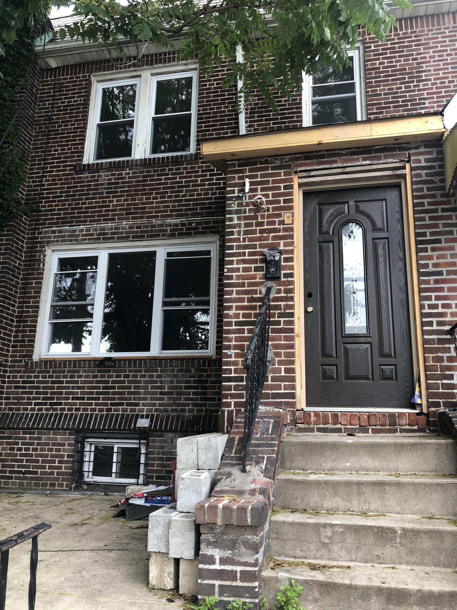 A solid brick 2 family house with 2 BR apartment on first and second floor, full finished basement  with outside separate entrance. House is being updated with Kitchens, Bathrooms, windows, floor and much more. It has a private driveway. A great house to live or for investment. Must see.