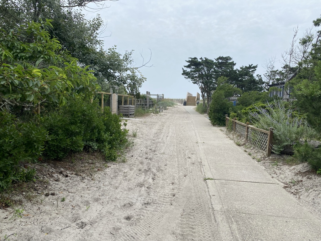 New Exclusive! Oversized 63' X 100' property just 180 feet from the beach! Ideal location on a quiet block in coveted Ocean Bay Park.  Enjoy the low carrying costs and laid back vibes that have made Ocean Bay Park so popular!  Build your dream beach house and enjoy ocean views.  Room to build a large house with pool!  The zoning allows for a single or 2-story home with a footprint of up 2,205 square feet as well as a roof deck, if desired.  There is an existing 2 bedroom cottage on the property in need of TLC, that could be made serviceable.  