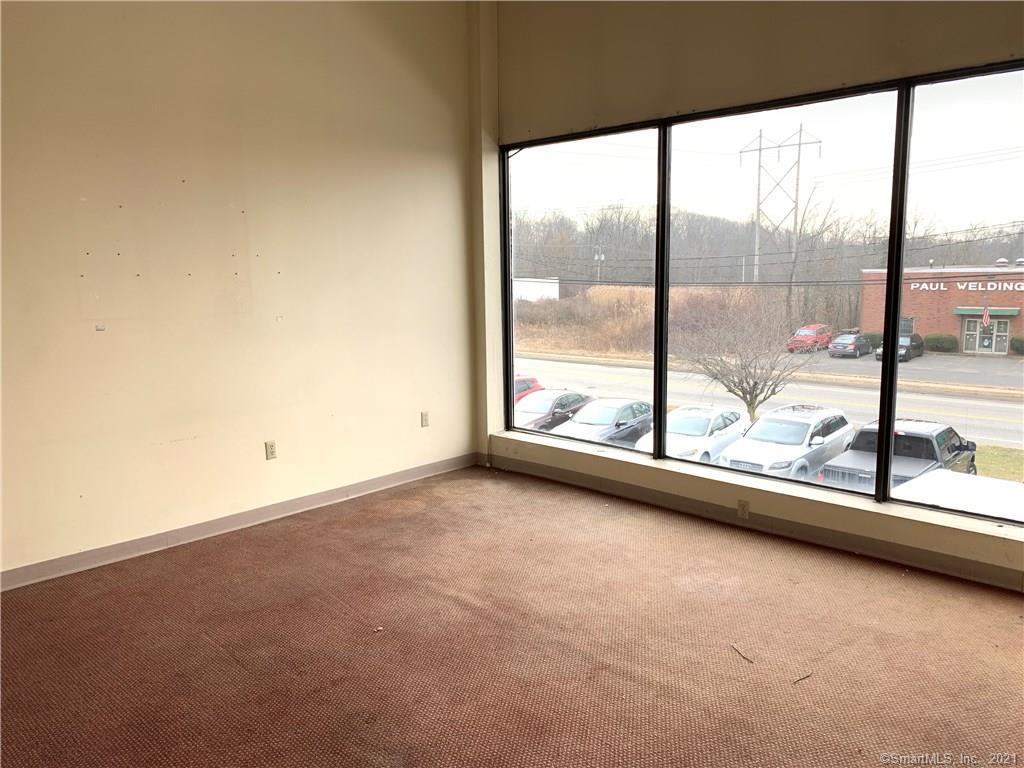 Approx 1800 sf of space for lease on 2nd floor can be used for professional offices, yoga, dance, karate studio etc. 13ft ceilings with restroom and shower. Tenant can easily change layout/build-out. Tenant responsible for monthly rent gas and electricity. on site parking and easy access to highways.