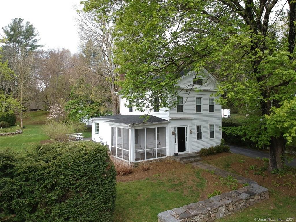 Welcome to 19 Pomperaug Road, a circa 1850's Greek Revival design in one of Woodbury's most scenic neighborhoods and just a few steps away from the falls on the Pomperaug River. Here's an opportunity to live in a bucolic enclave that's just a half-mile to Woodbury's finest restaurants. The home features the classic character of a vintage but is finished with contemporary style. Chef's and their guests will love the bright, sun-lit kitchen with vaulted ceiling, marble counter-tops, breakfast bar, window seat and French Doors that lead to a large blue-stone patio. The kitchen, mudroom and first floor full bath feature heated floors; cast-iron radiators provide comfort throughout the rest of the home. The second floor is accessed by two sets of stairs; one in the living room, and another leading to the mudroom from the 4th bedroom/home office. There's a pellet stove insert in the family room, and a free-standing pellet stove in the 4th bedroom/office; both will convey. The property is level and beautifully landscaped with hydrangea, hemlock, maple trees and stone walls; there's even a rope swing! Best of all, Pomperaug Road is not a thru street, so traffic is light all day. You can enjoy walking to town-owned open space, or maybe try some fly-fishing: the river is stocked with trout. Truly an enchanting little spot in extraordinary Woodbury.