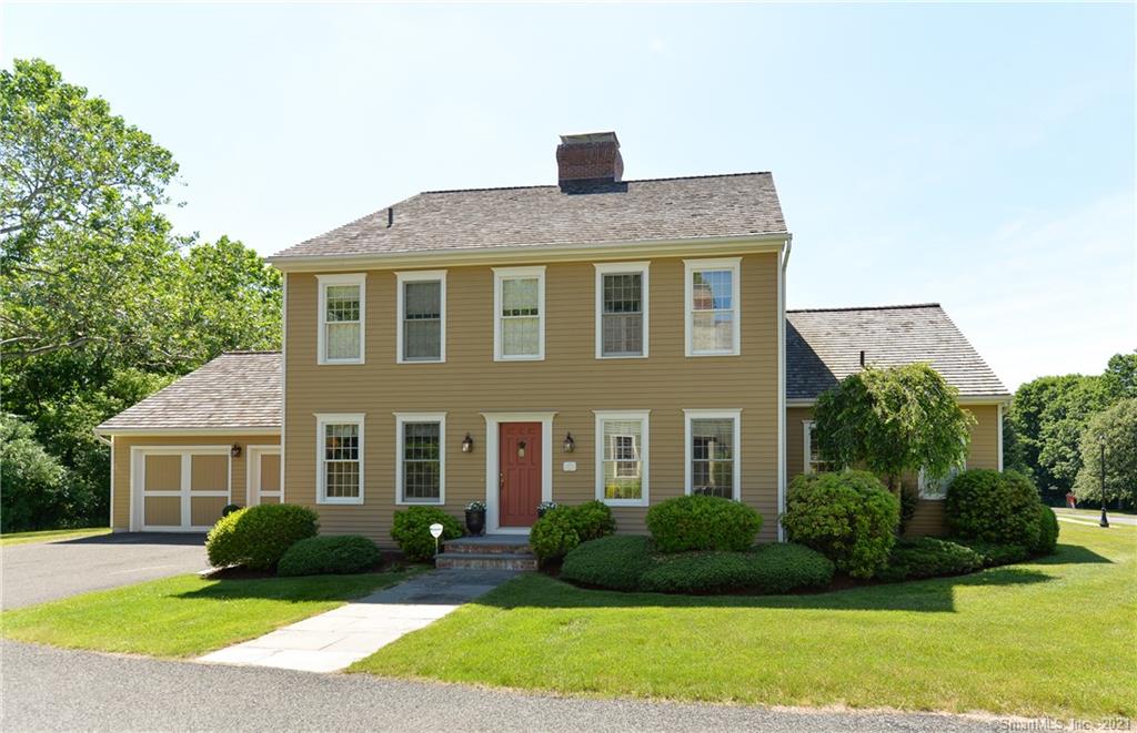 Elegant colonial in the exceptional South Brook Association of just 21 homes. Classic New England architecture, quality construction materials like cedar shingles and stone walls, expert siting and professional landscaping are apparent as one drives through the community. On a cul-de-sac with just one other home, 1 Hillview has one of the most dynamic backyards with long views of verdant lawn and specimen trees. Inside, the home has been meticulously maintained and upgraded since its construction. The main level offers hardwood floors, crown moldings and wood shutters. The formal living and dining rooms are in the front of the home and the living room includes a gorgeous wood burning fireplace. The renovated kitchen is open to the great room with its 18 foot ceilings and a huge farmhouse style fireplace and mantle with propane gas log insert. The kitchen offers custom cabinets with unique under cab drawers, Danby marble counters and high end stainless steel appliances. Out the French doors is the fabulous stone patio. Partially covered by a seasonal awning and surrounded by stacked stone walls this will be your favorite room in the house 3 seasons of the year. The first floor master features cathedral ceilings, walk-in closet and lux bath with soaking tub. Upstairs two more bedrooms share another full bath. The sunny office looks down into the great room. The basement has been partially finished into a great rec/entertainment space. A truly stunning and comfortable home!