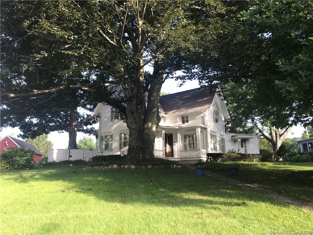 Every now and then you stop and something takes your breath away! Is it the old massive beech tree in the front of this stately Victorian or the beautiful grounds where passerby's look up from the historic district sidewalks? Come see this beautiful well cared for home with hardwood floors, great bathrooms, several extra rooms for possible in-law or office, front porch, enclosed back porch with fireplace, 3 patios and well cared for gardens and a 3 car garage with storage--all hidden from the street.  Reader's Digest named Woodbury Best Small Town in Connecticut and you will find award winning restaurants , established antique trail, hiking trails, private schools and located 1/2 hr to train station or 1 1/2 hr to NYC.