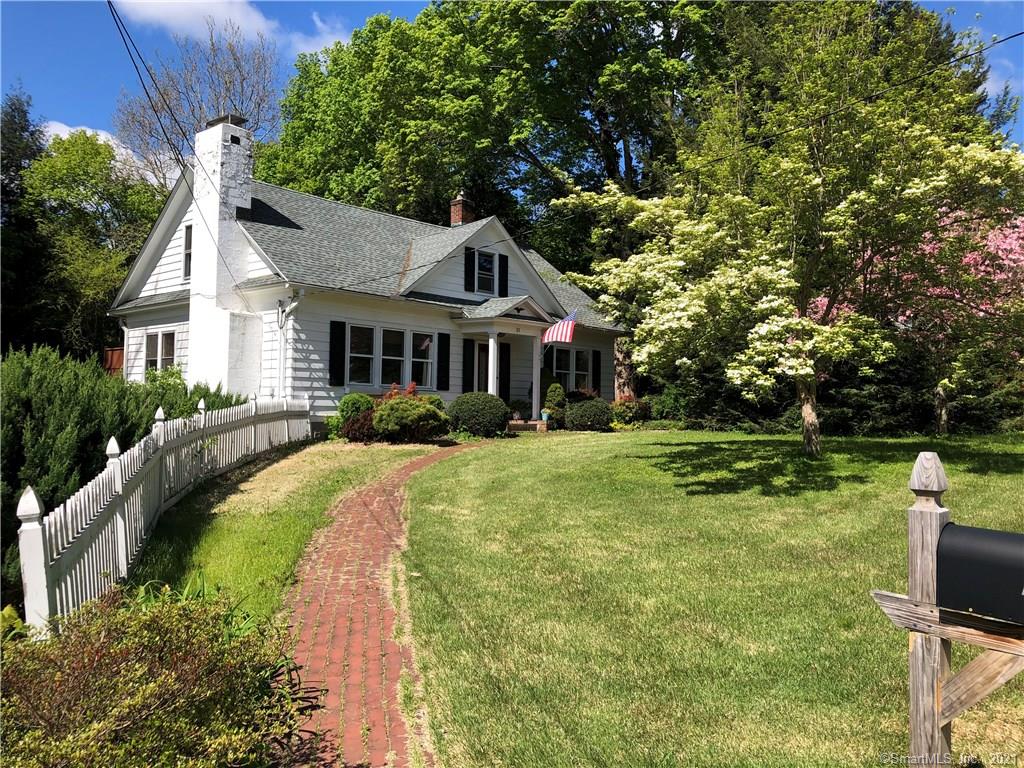 Charming Cape close to town. Perfect location off Main street in the heart of Woodbury. Walk to parks, schools, library, grocery and shopping. This incredibly cozy home features hardwood floors throughout, an open kitchen, lots of built-ins and fireplace. The house also has an enclosed porch, large deck and finished basement/playroom. Other features include granite counters, AC, flat yard, perennial gardens, brick patio, privacy. Agent Owner.