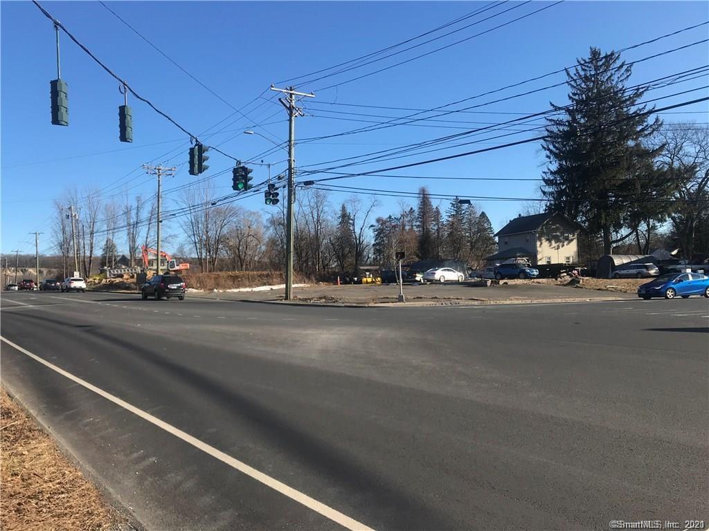 PRIME RETAIL DEVELOPMENT SITE CONSISTING OF 1.32 ACRES.  LOCATED IN WATERBURY'S EMERGING COMMERCIAL DISTRICT NEAR CHESHIRE & W/N 1/8 MILE OF I-84'S AUSTIN RD ON/OFF RAMPS BOTH EAST & WEST. RETAIL IN IMMEDIATE AREA CONSISTS OF COSTCO, RESTAURANT DEPOT, KOHLS, DOLLAR GENERAL, CARMAX ETC.  $25M AMAZON DISTRIBUTION CENTER BEING FAST-TRACKED FOR APPROVAL LOCATED AN 1/8 MILE EASTERLY. BUSINESS-FRIENDLY ENVIRONMENT. OTHER SHOPPING PLAZAS & MEDICAL FACILITY IN IMMEDIATE STRIP. CG ZONE ALLOWS DRIVE THRU, GAS STATION, BANK, COFFEE FRANCHISE, CAR WASH, MEDICAL. HOTEL/MOTEL, MULTIPLE USAGE. *** MIXED USE/UP TO 23 RESIDENTIAL UNITS ALLOWED ***OWNER/BROKER. * $ INCLUDES 51 MATTESON ST **