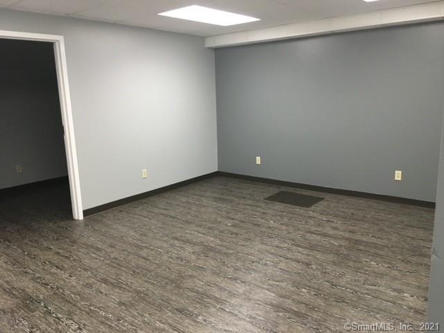 This 1, 600 sq ft office space features 7 large work areas as well as a private bathroom. The building is conveniently located on the northern end of Newington, near the Elmwood section of West Hartford. There is easy access to I84 and RT9 making this a great location for commuters. The open office space is just minutes from the Newington Town Center in one direction, and New Britain Avenue in the other direction. There is plenty of free parking for your staff and customers with easy entrance into the building. The office space for lease would be ideal for a technology based company since there is a backup generator on site and fiber optic networking throughout the building. Heat/hot water/electric included in your rent.