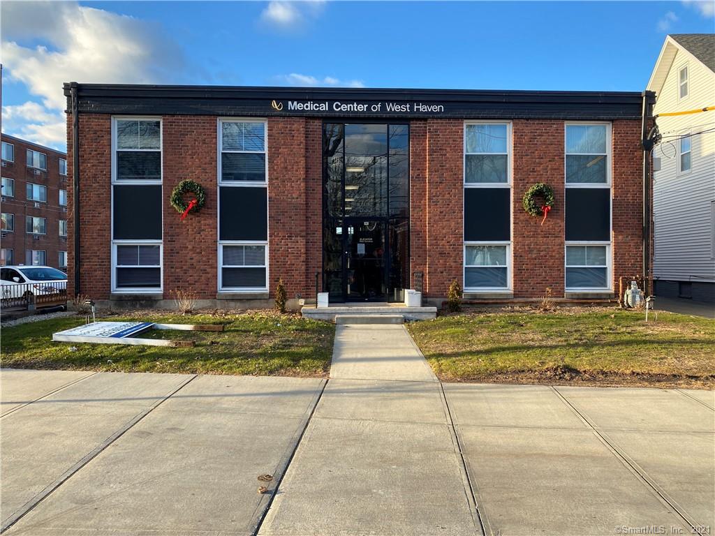 Take pride of ownership with this exceptional brick Medical/Professional 8 unit building. The MEDICAL CENTER OF WEST HAVEN. Some units are updated and she has 2 new roof top A.C./ heat units, newer windows, new water heater and interior items..chandeliers, burglar alarm, fire alarm... Condition is close to perfect with well maintained roof, top of the line boiler and newer elevator service. It's handicap accessible with a beautiful brass trimmed elevator. 20 parking spaces with 4 handicapped and unlimited addition municipal parking adjacent to property. Optium location across from the green in downtown West Haven. Currently 5 units are leased and 3 are actively listed for lease on the market.