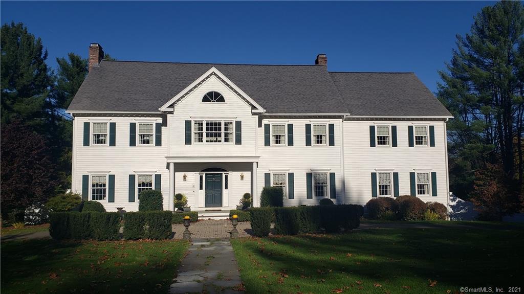 Fabulous design and style are evident throughout this 5200 square foot colonial in one of Woodbury's most desirable subdivisions! Located just two-minutes from the town center, this meticulously maintained and updated home provides generous room sizes, several different gathering areas, two fireplaces, extensive moldings, high ceilings, a two-story foyer, an expansive deck & patio, and a gunite pool. The main level includes a front to back formal living room with built-ins, fireplace & game area, a cozy office, a formal dining room just off the kitchen, a family room with a stone fireplace and back staircase, and finally a beautiful kitchen with a large center island and eat-in area overlooking the pool and yard. The upper level offers four guest bedrooms, one of two laundry areas, three full baths, and a luxurious master suite and master bath. A walkout lower level could make an ideal in-law apartment as it provides another gathering room, a second laundry area, a full bath, and your very own movie theater with eight comfy seats. This finished ground-level area conveniently walks out onto the patio surrounding the pool and provides easy access to changing areas and the full bath during picnics and gatherings. Other outdoor space includes gorgeous walkways, stone walls, level yard areas, a circular driveway, mature landscaping, and a three-car garage. Beautifully maintained, designed, and furnished!