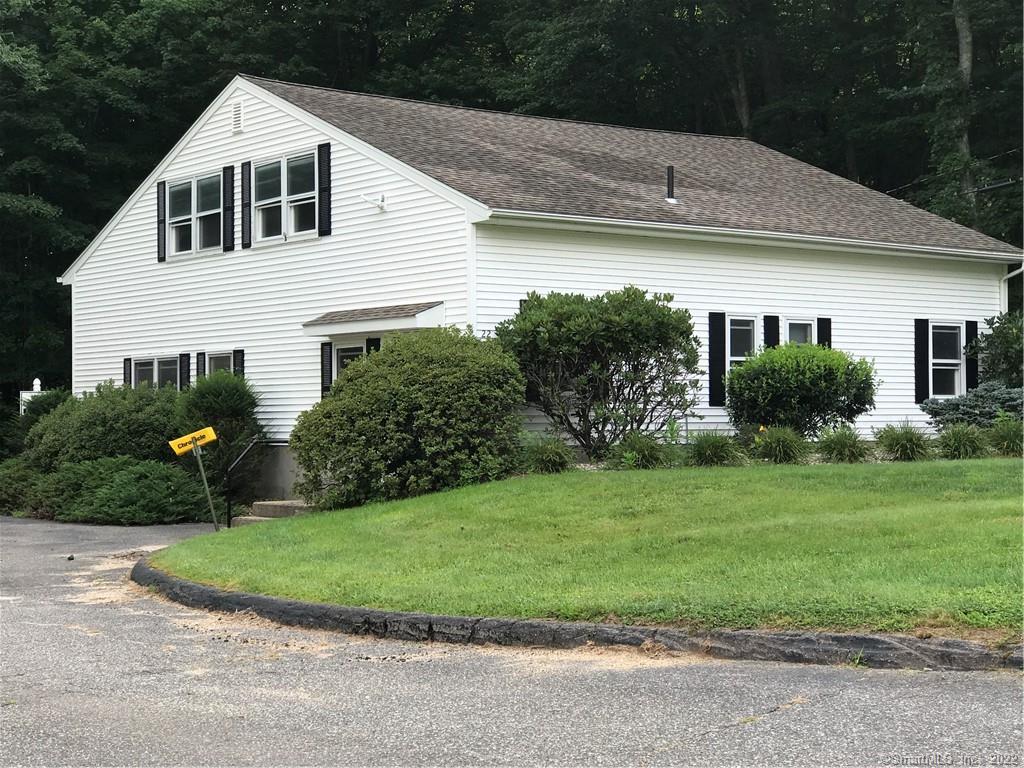 2, 160 SF of professional office building, #22 in the Professional Park complex near UCONN in Storrs. $3, 600/mo +NNN. Entrance to the complex is at a signaled 4-way light across from the main entrance to UCONN on Route 44 (Middle Tpke). The space consists of 2 floors. The first floor consists of a large open lobby with two large conference sized rooms, one office, storage closet, and large handicapped bathroom. The 2nd Floor has three (3) offices with an open common area. The 2nd floor is not handicapped accessible.There are two entrances. One with a handicapped accessible ramp. Owner is a licensed real estate broker.