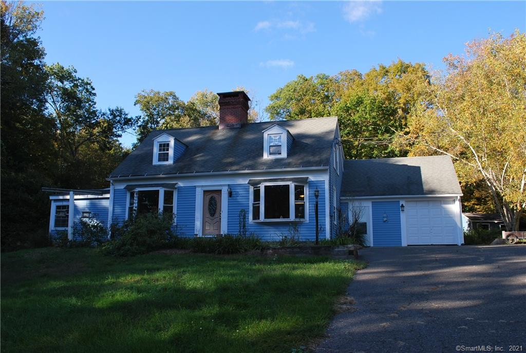 Secluded 8.39 acres horse property on Main Street Woodbury is home to a three-bedroom Cape. This home has wood floors throughout, freshly painted exterior and oversized deck August 2021. The kitchen has plenty of storage space and an island which you can see from the dining room. The living room has a large wood burning fireplace, bay window and new sliders to a private back deck. The Master bedroom is on the main floor, has 3 closets and a full bath. The upper level offers 2 large bedrooms with ceiling fans and a large full bathroom. The lower level is home to the laundry, storage, wood stove, and room to expand with sliders to the outdoors.