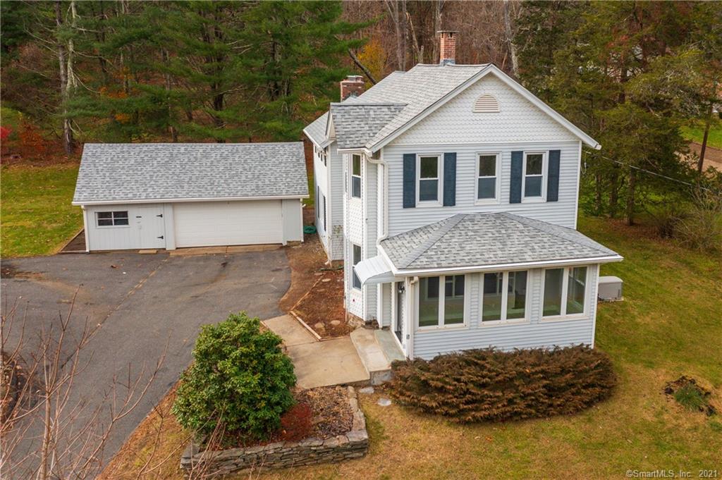 This immaculate early 1900s Colonial has been perfectly restored to like new condition inside & out. The perfect combination of old and new situated on a peaceful tree lined street overlooking a beautiful pond and open fields. Just minutes to the center of town, shopping, highways and everything Woodbury has to offer. A bright & airy layout with hardwood floors throughout both levels is perfect for today's lifestyle. Tastefully renovated open concept kitchen w/granite counter tops, custom soft close cabinetry, stainless steel appliances & tiles back splash flows into the dining area and fireplaced living room. THIS HOME HAS IT ALL-whole house generator, new roof, new well tank, vinyl siding, LED lighting, new appliances and a 2 car garage with a seperate heated workshop. Don't miss out on this turn key opportunity!