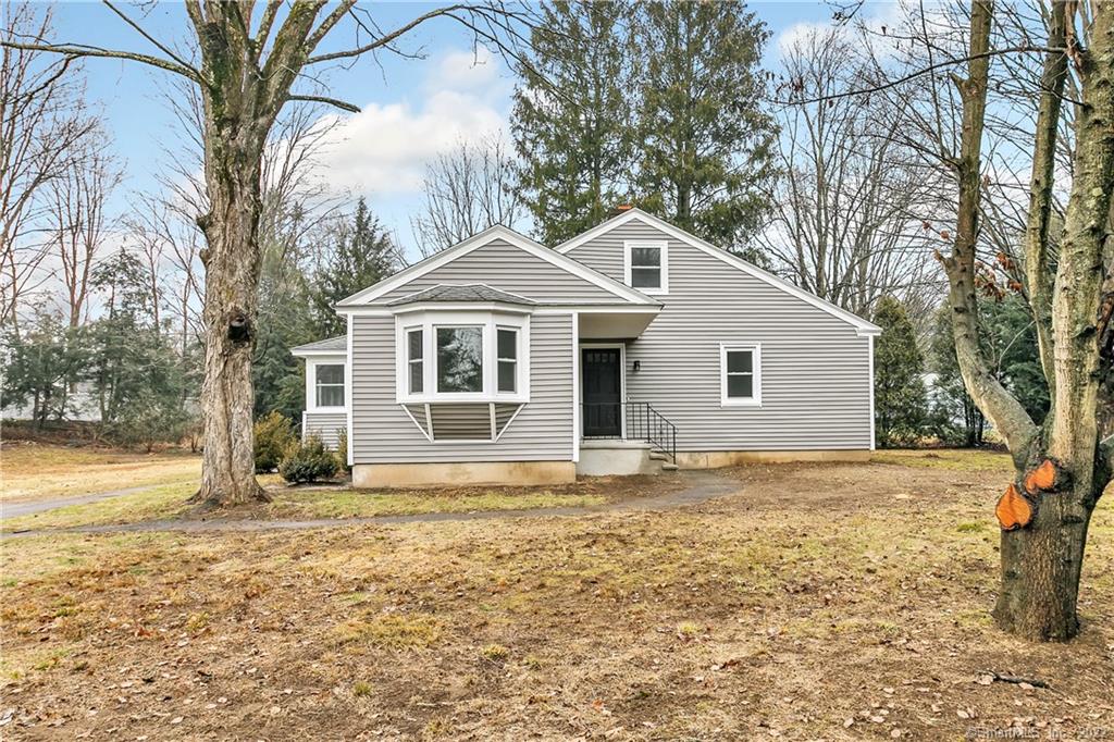 Beautifully remodeled Woodbury home! This move-in-ready 3 bedroom 2 bath home has been completely remodeled and is walking distance to charming downtown Woodbury. The fabulous kitchen boasts new cabinetry, quartz countertops, subway tile backsplash, and stainless steel appliances. Solid hardwood floors flow seamlessly throughout the main level where you will find a large living room with wood-burning fireplace, a master bedroom with a stunning full bath, 2 additional bedrooms, and an additional full bath also completely renovated. The finished walk-up attic is the perfect place to expand your living space with brand new carpet and paint. Back on the lower level, the heated mudroom offers tons of windows for natural light will lead you to a large level lot where you will find a detached 2 car garage and plenty of privacy! With new siding and windows, this perfect home is destined to impress so schedule your private tour today!