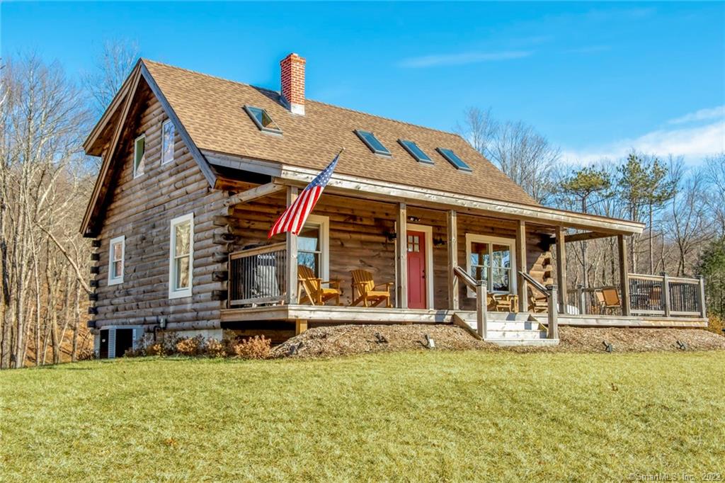 You dont need to go to Vermont, your dream home is right here in Woodbury. This 2 bedroom, 2.5 bath home sits on 3 acres of beautiful, private land. No detail was spared with this unique and custom home. It started with a 6X8 D log home kit, situated perfectly on a western facing lot. It was constructed with effectiveness and energy efficiency, and then finished with Cedar decking, Pella windows, Ash floorings and solid Alder wood interior doors. The kitchen has stainless steel appliances and granite counter tops, the large center island offers more counter space and storage, open to the dining area with lots of natural light. There is a main level master bedroom with a brand new master bath, living room with vaulted ceilings and skylights and half bath/laundry room. The upper level has a open loft area, full bath, skylights and second bedroom. This home is remarkably energy efficient using propane heat and central air. Electric bills are consistently under $100 per month. And if desired, you can heat the house entirely by wood. The walk out basement has the potential for more finished room. The eastern side of the property borders open space for added privacy. Just 75 Miles from NYC! If you don't buy it this week, someone else will!