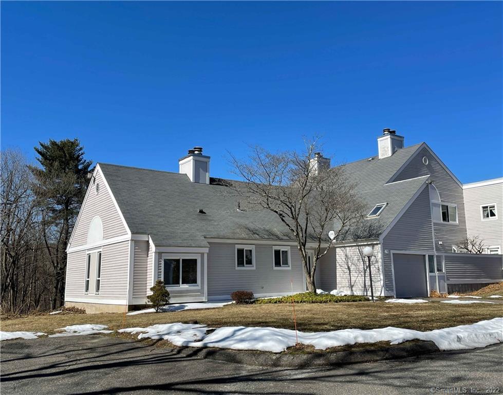 This sun-lit two bedroom Woodbury Place condominium is located close to the Southbury town line convenient to shopping and just 10 minutes from I-84. You're surrounded by nature in an end unit with windows on four exposures. The combination living room/dining room features a wood-burning fireplace and sliders to a spacious 300+ Sq Ft blue-stone patio that's also accessible from the one-car attached garage. There's one full bath on the main level with a half bath adjacent to the upstairs loft. A walk-in attic provides storage space and access to the heat pump's air-handler. Woodbury Place is a community of just 24 units with professional off-site management from CM Property Management of Southbury.