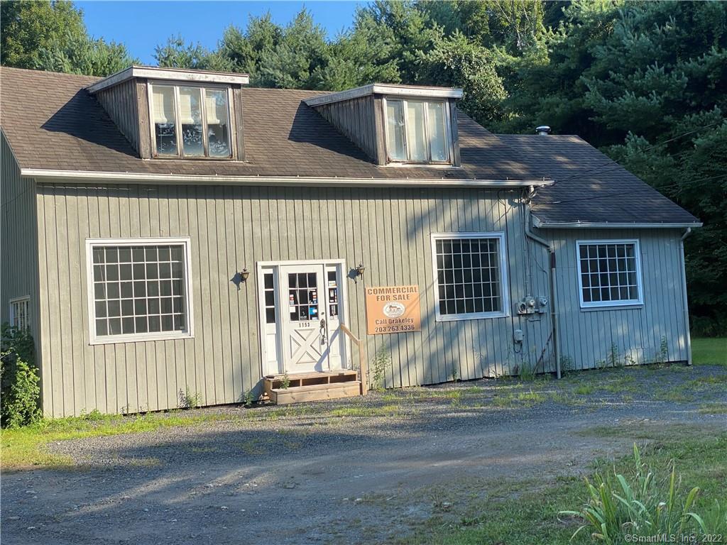 This building is as you enter Woodbury next to Constantines Restaurant from Southbury and only minutes to I-84. Woodbury was named The Best Small Town in Connecticut by Reader's Digest and includes beautiful hiking trails, Hollow Park with its pond, sport fields, playgrounds and picnic areas. The famous and historic Glebe House is located in the Hollow with gorgeous vintage homes. The town includes re known restaurants and antique shops and the sidewalks are always in full use! This is a great location to have your business and reside on the second floor. Come!! Join us in Woodbury!! Selling as is.