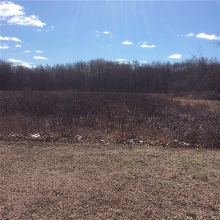 3.8 Acres cleared lot. Residential - come bring your ideas for this level lot. Many possibilities await this property. Bring your plans. Close to shopping and RT2. Public water and public sewer on the street.