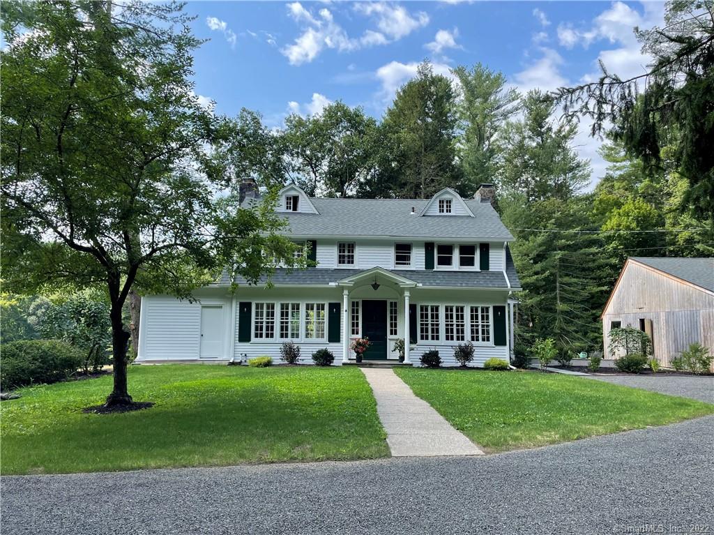 Gorgeous property with expansive field running along Sprain Brook.House site consists of 8.2 Ac. with an additional 5.2 Ac. (Parcel#933756.Taxes:$238.90) across the road on a separate deed, a steep, rocky piece that provides protection.The 5-Bedroom 2 full/2 half bath 1920 Gambrel Colonial has about 3, 000 SF.The house is full of period character and provides a lot of flexibility for use. Dining Room has a Fireplace with wood stove; a delightful year-round Sunroom overlooks the lower field. Study with a wall of cabinets and bookshelves is the perfect home office. Walk-out Basement provides a spot for pool and ping-pong tables. Living Room with stone Fireplace and Kitchen both open to a spacious, elevated Deck overlooking the beautifully groomed lower field, rushing brook on far side, gazebo, and clay tennis court that has seen many enthusiastic games over the years.Plenty of room for baseball, frisbee, picnics, and veggie gardens.An interesting array of wildlife considers the field its own and provides plenty of amusement for birdwatchers and photographers.Separate two-car garage solidly built with an I-beam sits on the gentle slope and provides additional storage both in loft area and below grade for tractors, etc.Located between Main St Woodbury and Washington Depot, the property provides easy access to the charms of both towns and the lure of land trusts, lakes, gourmet dining! EXCEPTIONAL GATHERING PLACE! First time on market in over 50 years! Please no drive-throughs.