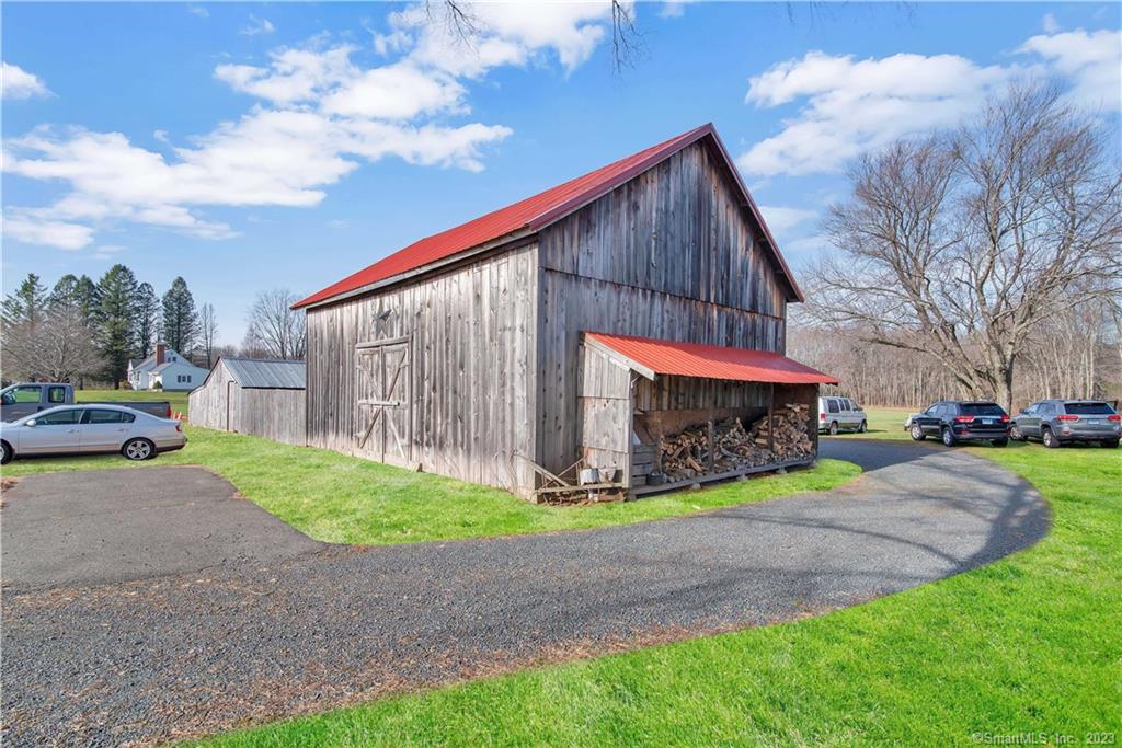 23.13 Acres Zoned Industrial Includes 30x40 Barn and 1200 sq 1870 built FarmhouseThere is Much Potential for Industrial Development, the current use is farmingThe Current Status is Title 490 Tax CreditThis Location is Surrounded by much Prosperous Business, Mature Residential Subdivisions, and Active FarmsLot Dimension is 435 Frontage x 1700 side yard All Buyers Must be accompanied by their Realtor For Confirmed ShowingsThe Sale of the barn and house will be sold in As Is Condition (They have been maintained and in good shape) Include as is rider attached with offerTo View an aerial: https://www.bing.com/maps/?q=143%20MOODY%20RD%20ENFIELD, %20CT%2006082