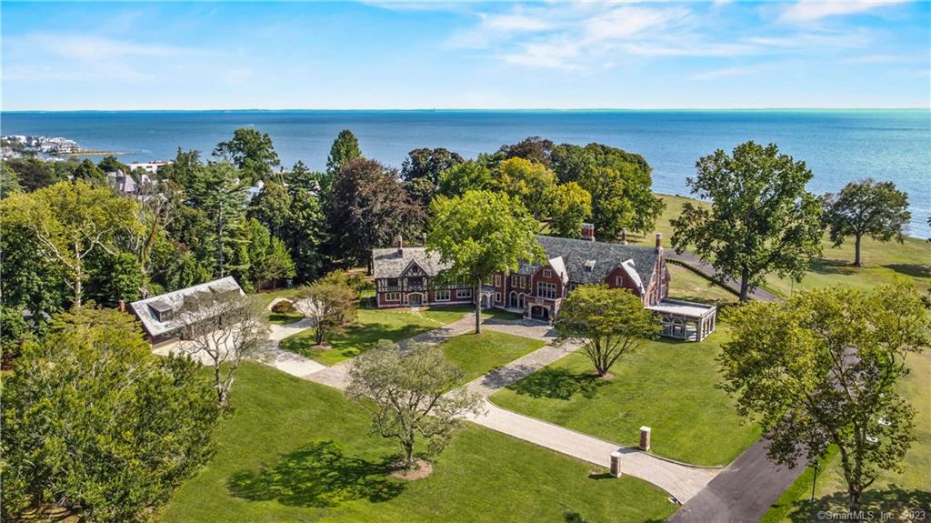 ONE OF THE SINGLE MOST ANTICIPATED, MAGNIFICENT, AND BREATHTAKING ESTATES ON THE GOLD COAST HAS JUST HIT THE MARKET! This architecturally brilliant and elegant home was built for entertaining and lavish gatherings in Gatsby-Esque style. A rare opportunity to own nearly 3 acres of property on Fairfield County's most prestigious address, with SPECTACULAR views of Long Island Sound, Sasco Beach, and the Country Club of Fairfield's Golf Course. Refreshed to its grandeur, with no expense spared by the owner, you will be impressed the moment you enter this estate. Presenting 19, 000+ SF on 4 levels of living, 30+ rooms each with its own unique features and design, 9 Bedrooms, 13 Baths, Elevator servicing all levels, PLUS a 6 car Garage/Carriage House with staff apartment above. A private oasis and yet minutes to Fairfield and Southport center, train, library, harbor, restaurants, and shopping. Ideally located and 53 miles to New York City. This is a once in a lifetime opportunity.