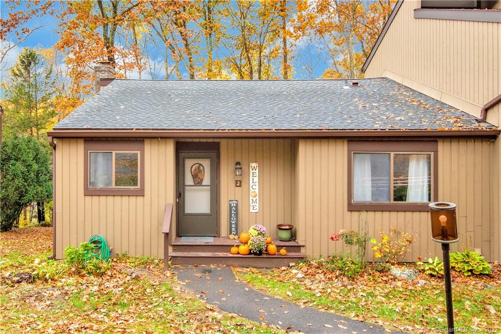 Spacious, end-unit, Ranch-style townhome, located in the desirable Woodlake Condominium Complex in Woodbury! Open-concept combination living & dining room with vaulted ceilings, shiplap accent wall, lots of natural light, and slider that opens up to your private deck overlooking the wooded backyard. The main floor also includes kitchen with refinished, white-painted cabinets with new hardware, sought-after main level primary suite and a second bedroom each with their own full bathroom and lots of closet space. This townhome also includes a partially finished lower level adding an additional 700 SQ FT of potential living space, with a large, open family room with fireplace, sliders to back patio, laundry area, half bath, and extra storage space. Other amenities include a flat walk from parking to your front door, ample visitor parking, and many recent updates including: freshly painted walls throughout, new vinyl plank flooring throughout entryway, dining room, and hallways, new carpeting in living room and bedrooms, and new ceramic tile in the primary suite bathroom and kitchen! Many life long residents make up the Woodlake community, where residents can play & hike on the trails in the many acres of woods surrounding this popular complex. Just minutes from historic town center of Woodbury, I84, & all that Litchfield County has to offer. *Sale is contingent upon seller finding suitable housing.