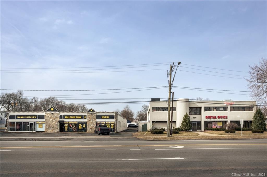 Rarely available Retail Strip Center and Office with value add potential by leasing out a portion of available office space (perfect for owner occupant). Located on the Silas Deane in Wethersfield created a high population for client of all businesses, and high visibility for this asset. This investment opportunity consists of 2 buildings and the unit mix consists of: 239 & 249-251 Silas Deane Highway, the retail building consisting of Chinese Food and a Pawn Shop, Office consisting of dental/medical, vacant unit, and Pediatric tenant. Please note, both buildings must be sold together per town zoning requirements. Dental/Medical Office $1690.34/monthRestaurant $1908.90/monthPawn Shop $3000/monthPediatric Office $3000.00/monthVacant Unit: Insurance Agency $2000.00/monthThe asset has over 18, 000 SF and is situated on over 0.7 acres. (6, 000 sq feet for retail building and 12, 000 sq feet for office building approximately.)The tenant pays for heat and electric. Landlord pays for insurance, common area electric, snow removal, heating/cooling for available space and elevator servicing and licensing. Please do not visit asset without the listing agent.Vacant unit is listed for rent now, do not hesitate to inquire with listing agent before rented if interested in being a owner occupant. Property improvements include-Recent repairs to roof, new elevator, and completely renovated vacant space.See below additional comments in Public Remarks.