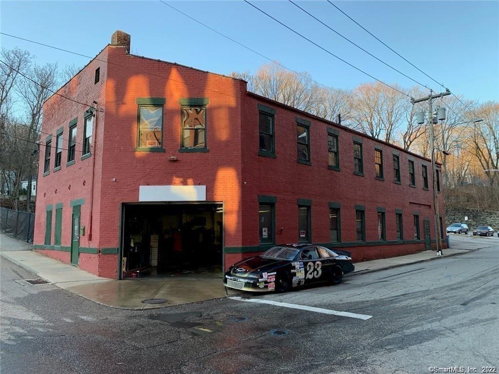 This Is an opportunity to own a piece of Historic Property in Downtown Norwich. Located in The Chelsea Central Business District, This 8064 Sq property includes a 6000Ft 2 story Brick Building With a Large fenced Parking Lot estimated at 7000 sq ft which could hold around 21 cars, as well as an approximate 2000 sq ft outbuilding. This out Building is more of a footprint being it needs an overhaul. This is Zoned For MANY OPTIONS for use such as MIXED USE ...Bar, Cafe, Restaurants, (No drive-throughs), clubs, commercial entertainment centers, museums, galleries, libraries, employee amenities, beauty shops, Laundry facilities, photo studios, financial institutions, research lab, chemical/ pharmaceutical, vet clinic, medical office, off st parking facility, and more. Currently used as an Auto shop, if different than current use, a new application and codes would apply. The Ramp to the second floor has been re built with steel. Take advantage of the progression to come in this beautiful Historic city Set up your Showing Today! Also According to the City There are grant monies available for code upgrades , for this Property. all agents to verify all information and follow through with due diligence.