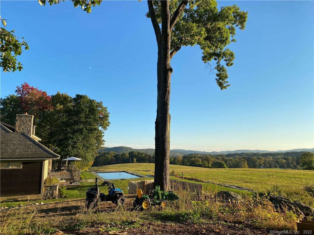 4 bedroom 3.5 designer inspired home intended to complement the splendor of its natural surroundings. Fully furnished for comfortable luxury. 3 fireplaces and awe inspiring panoramic views. Soak in a breathtaking scene spanning the great meadow, rolling hills and mountains beyond. Long driveway with mature landscape, this hideaway provides pure enjoyment of vast recreation just outside your door with 70 acres of open and wooded land perfect for riding, biking, hunting and hiking. Open floor plan encompassing the kitchen and dining area. The space was designed to deliver ultimate enjoyment for the home gourmet, entertaining and family gatherings. The modern structure of glass, stone and wood make this a quintessential country retreat at it's best. Minutes to Pawling's quaint village and Metro North train station.