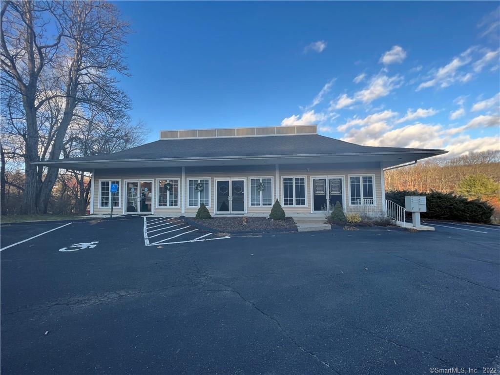 NO NNN! Excellent location for a retail shopping plaza with both retail and office, on a street corner of Route 25/South Main Street in Newtown, CT. Gorgeous end-unit is 1, 000 SF and is built out for office use of multiple business uses. This would be ideal for any business, therapy, consulting, small law firm, accounting, etc. Any professional use or small business start up, etc. The large parking lot features tons of parking. with a large parking lot and is 1, 000 SF. Unit has a large open area that currently has a large pool table and plenty of additional space around it, 2 offices, restroom and storage. Other uses in plaza include: a hair salon, a bridal store, Happy Dog dog grooming and a massage business.This unit, as the others, feature double glass front doors at entry and double large windows for display and signage on either side of the doors. This end unit has a side unit window. Signage above unit door and on monument sign at front corner of property directly on Route 25/S Main Street is perfect for visibility. Additional windows in the rear and side of the unit. This unit has the most amount of windows. Mailboxes to each of the units are next to this unit and so is the staircase to the front of the plaza. This move-in-unit is ready to lease TODAY!