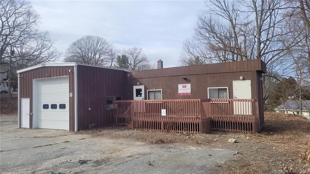 $2000/month plus utilities. Garage and Large yard area for lease great for trucks or contractor yard. 14 foot drive0-in door, small office, storage area and restroom