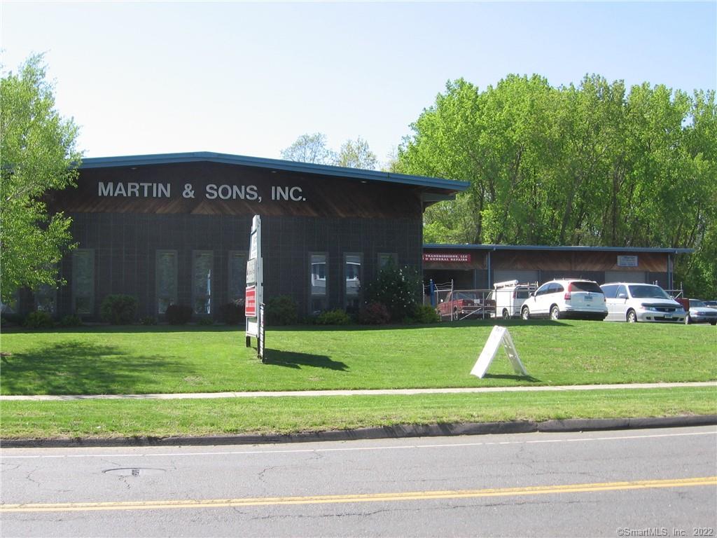 Space includes 1250 SF garage area. 12 x 12 overhead garage door. Good location for service establishment, wholesale business, repair services, small contractor, small distribution, or small manufacturing. Zoned general business. Includes carpeted office (245 SF). Includes shared kitchenette.