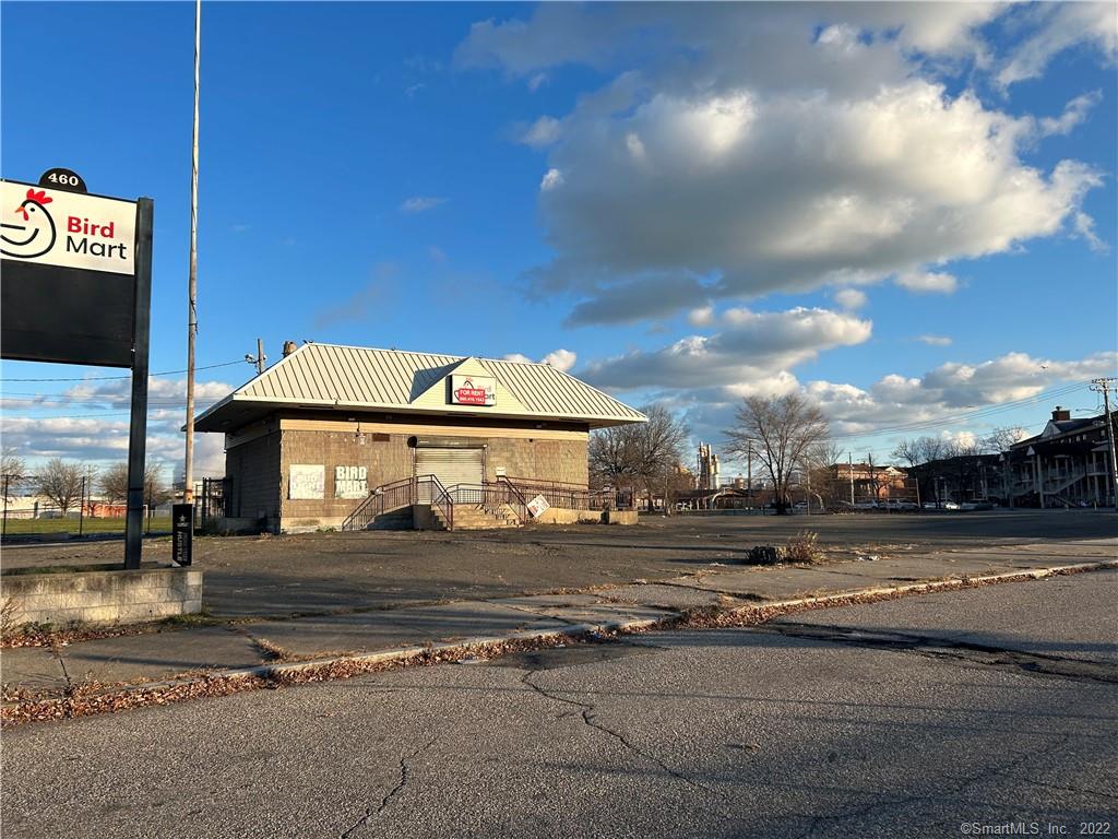 Large leveled lot with lots of parking and a small stand alone building with modern electrical and high efficency HVAC system. Phase three power. Minutes away from direct access to I-95.Perfect for a contractor/ landscaper, tile, marble businesses to store equipment or containers and have small showroom or office. Owner will fence-in the lot per user need. Lower lever offers lots of storage space. ?Please complete due diligence for uses.