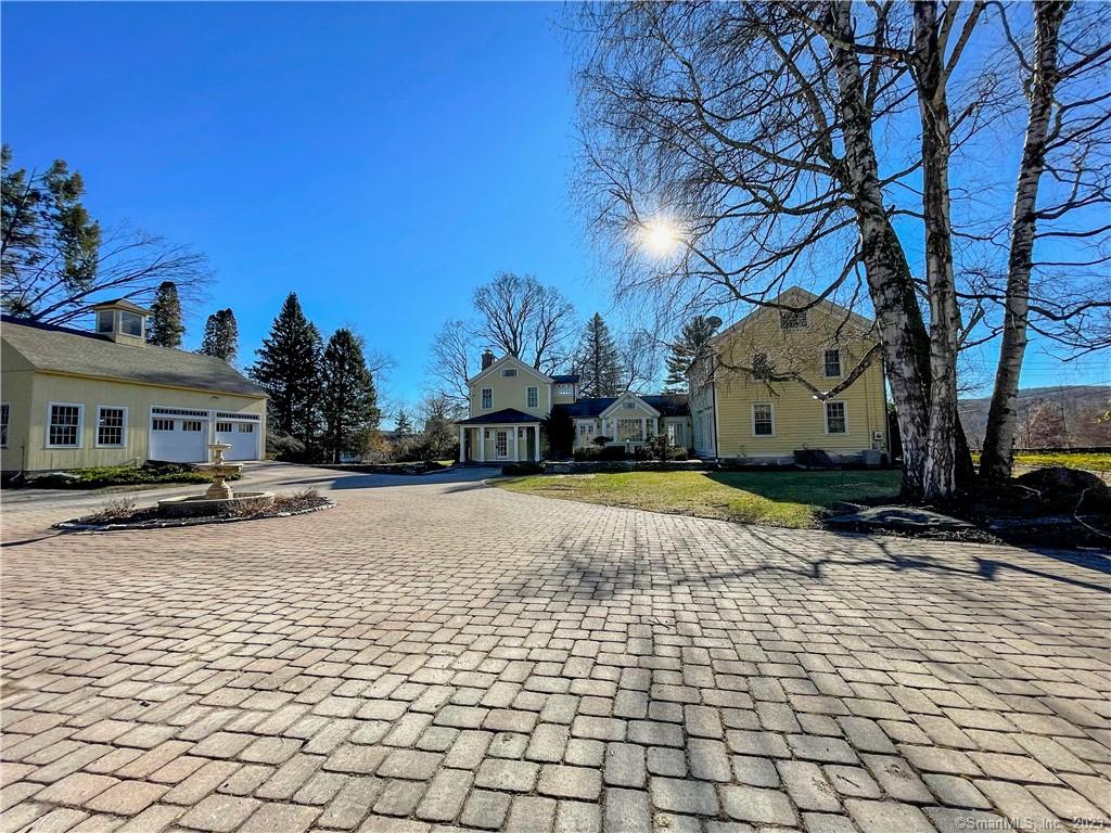 Welcome to 140 Stilson Hill Rd. This Stunning property is ready for its next owners. Nestled in Litchfield counties scenic hills sits this gem that has it all. Pull up to your antique gated estate with a circular brick drive, large 2 car detached garage with 2nd floor, fountain, raised courtyard, Exquisite 5+ acres of mature plantings, stone walls, fruit trees, raised garden beds w/sprinkler system, hot tub, screen porch and brick patio in back with built in grill great great for entertaining. The home has 3 bedrooms, 3 full/2 half baths , DR, LR w/fireplace, FR w/fireplace, den w/fireplace, kitchen and office. Stunning Old pine and oak flooring throughout . Built-ins in FR, MB and den. Kitchen has subzero refrigerator, gas cooktop, double wall ovens, dishwasher and granite countertops. So if your looking for privacy or some extra room this estate could be perfect for you, so don't wait schedule your private showing today!!