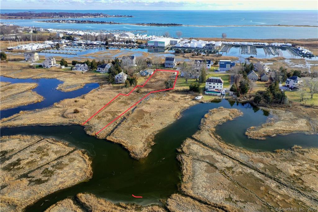 Build your dream home on this beautiful waterfront lot overlooking Long Island Sound Inlet. This inlet has direct access to Long Island Sound. Dock permit is pending approval. Walking distance to Aqua restaurant, marina's and beaches yet on a quiet dead end street away from all the hustle and bustle of daily life. Train Station 1 mile away. Clinton Beach is 1.9 miles away, Cedar Island Marina .9 miles away. Come take a look at this hidden gem!