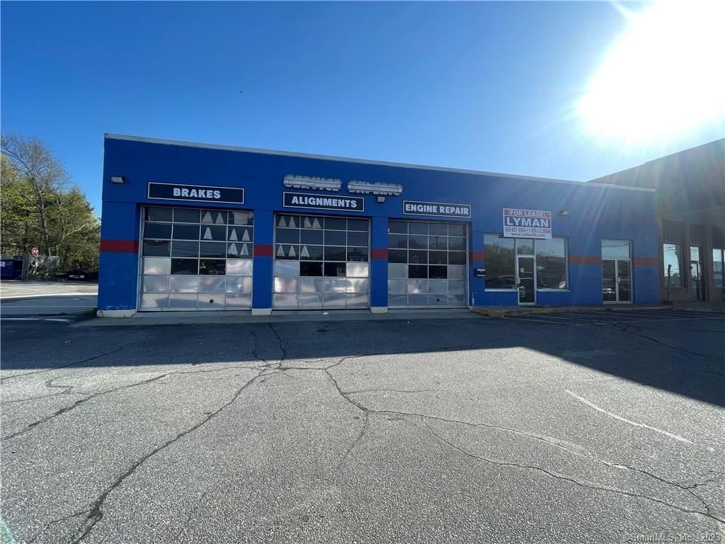 FOR LEASE-$3, 600/month + NNNs-3, 000 SF shop w/ 2, 000 SF basement-16-18' clear-(3) 12' overheads doors facing Main Street, (2) 12' doors on opposite side-Modine Space Heater-10, 000 pound capacity Rotary Lift-Year Built: 1958-Public Water & Sewer-Frontage: 257 Ft.-Zone: B2-Traffic Count: 14, 300