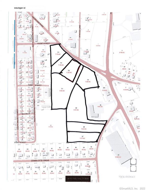 Commercial land located at the Wauregan four corners. Prime spot for development. The 16.9 acres is a combination of 8 lots. Some lots may be able to sell individually. Dollar General is located across the way. Located near the old C & M Corporation and in the area of other Commercial Industrial Buildings.