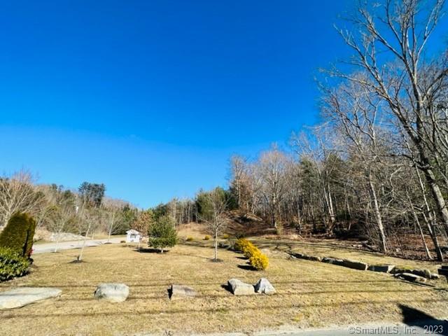 Builders or home owners look!CITY WATER CITY SEWER! Approved Building Lot. Driveway would be off of Subdivision. Close to RI Line and 395 for commuters. 2 Lots Available!