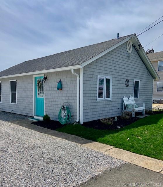 Tranquil seaside cottage with stunning views and access to 2 private association beaches just a short walk away. Bliss by the Sea is a cozy 2 bedroom home with a coastal design that is perfect for a summer filled with ocean breezes in a sweet New England beach neighborhood. Light up the BBQ grill and relax on the new 12x26ft trex deck with an ever changing view of the salt water marsh where you can see beautiful blue herons and osprey glide by. The association beaches set the stage for a gorgeous sunset so you can end your day with breathtaking displays of color. Enjoy beach living right from the backyard by kayaking out to the ocean during high tide. Join association events such as weekly beach yoga classes, outdoor movie nights or join a 4th of July kids bike parade. Amenities include, central A/C, off street parking, washer & dryer, fully equipped kitchen with stainless steel appliances and granite counter tops, wifi, towels and bed linens, TV, kayaks, SUP, BBQ grill, gas fire pit, beach chairs. Queen size bed in master bedroom. Daybed in second bedroom has a pull out trundle bed providing two twin beds. Sofa couch allows for extra sleeping space if needed. Available August