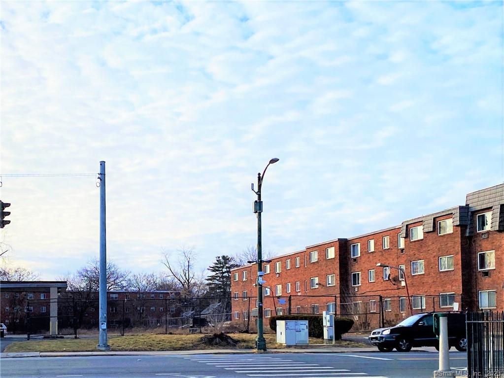 Hartford Needs Hosing! This is a South End building lot near Buckley High School to build a new apartment building. Ownership had prior plans to build a three-story building with a mix of bedrooms totaling 14 units to CFHA funding standard. The MX-1 zoning regulations state it will allow up to 5.5-stories and more units. There are many advantages to developing this site including limited parking requirements. The town zoning states The MX-1 district is a lower intensity district intended to be compatible with adjacent historic neighborhoods. This district includes office, institutional, and/or residential uses in a mix of lower scaled General, Apartment, Row, House A, and House B Building Types. This lot is between a 30-unit three story apartment building and a church. The curb cut is on the 30-unit apartment build side just before the stop light. It is walking distance to Buckley High School. Close to the Brainard Road exit off I91. The lot has 55 feet of frontage on Wethersfield Avenue, 64 feet across the rear, north side is 345 feet and south side is 342 feet. Lot size 0.46 acres.