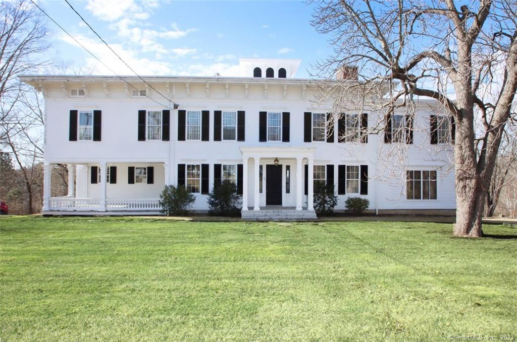 Welcome to the Charles H. Sanford House, which was beautifully built by Charles H. Sanford in 1840. Simply stating, this is the Antique home you've been waiting for. Location, location! This stately home is located in the Historic area of the bucolic town of Bridgewater, located on Main Street. this gorgeous Greek Revival with its stately covered porch and columns will impress all. You will be glad you showed it with all its grandeur. This Colonial offers something for everyone, a multi-generational family, an apartment with a private staircase, that could accommodate in-laws, or a nanny or staff, which makes it easy in many scenarios. The grand foyer entrance sets the tone for the rest of the home. Sunken living room with F.P., hardwood floors, beautiful moldings, 10ft. ceilings. and a grand staircase for many family portraits. A detached 4-car garage with additional storage under the building. Don't miss the old ice-box door off the kitchen porch too. The remodeled top-of-the-line kitchen offers all new appliances, granite counters, an island breakfast bar, a walk-in pantry that offers plenty of room for prepping meals, and room for all day coffee bar! (Kitchen is a work in progress and will be finished before closing, remodeled powder room will be completed before closing, ) At the north end of the house a comfortable Library with plenty of room for a pool table, enjoy a glass of Brandy in front of the fireplace. ( CHECK ADDENDUM PLEASE)