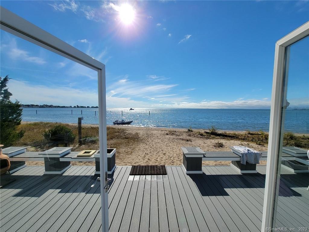 ATTENTION BOAT OWNERS!!! SPEND YOUR SUMMER ON AN ISLAND!! Unique opportunity to stay in this great upgraded waterfront cottage overlooking Long Island Sound and sandy beach. BOATERS TAKE NOTICE. Accessible only by boat, there is docking harbor side and a clothesline mooring for small skiff in front of the property. A huge deck with awning looks out over a wide sandy pristine beach. Central Air Conditioning and dehumidifier. Easily sleeps 6 (2 full beds & 2 twin beds), with new linens. Tenant responsible for their own towels. Furniture has new cushions and everything has been freshly painted. This is a lovely quiet community, perfect for relaxing. Lots of privacy. Perfect location to have family or friends over for a lobster bake, picnic, or just watch the fireworks... Offered at $12, 000 per month for July & August..available other months...call for pricing.