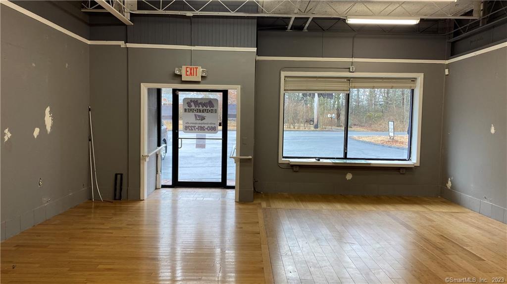 This 1500 sq. feet would be great for retail space. Large front room with large storage area in back (wall between the 2 areas can be removed) with a large bathroom and storage.Tenants share in the plowing and garbage