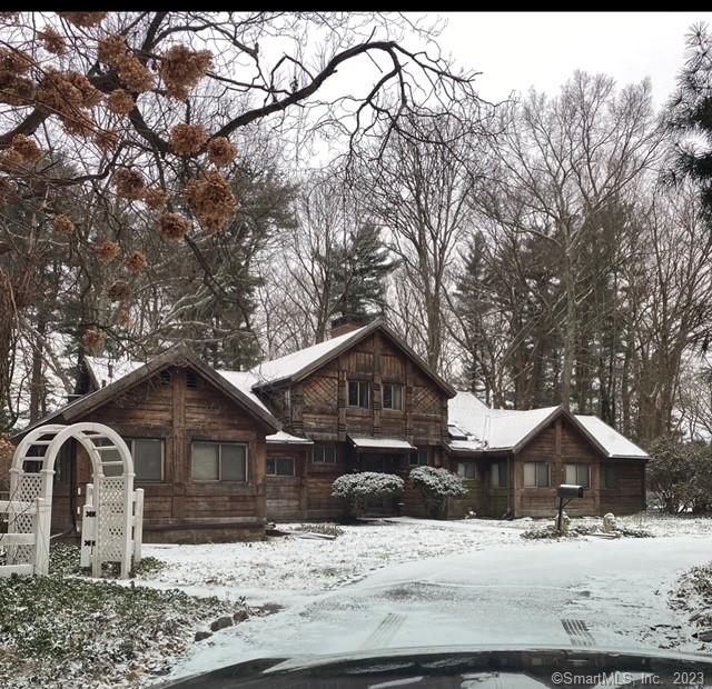 SEE ATTACHED FLYER. Located in affluent Fairfield County, this 3, 506 square foot country manor home built circa 1938 sits on a 4.39-acre wooded, lakefront lot with 221' directly on Beaver Dam lake. There are 9+ rooms, including 4 bedrooms, 2 fireplaces, living room, dining room, eat-in kitchen, den, 4 bathrooms, an enclosed porch and a semi-finished basement with kitchen and bathroom. Siding is Redwood and stone. Heat is oil-fired hot water and there is central A/C. There is a 2-car detached garage, a stone patio and a boat dock. Taxes, as of 7/1/22: $17, 806. This rare find needs renovating and updating but has tremendous upside. Price: $3, 500, 000 includes adjoining 2.89 lakefront lot. Properties are subject to HOA Right of First Refusal.