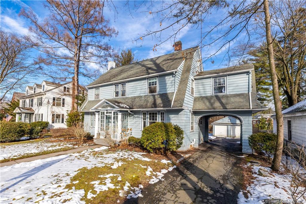 Early 1900's Colonial Revival in Hartford's lovely, historic West End. Directly across from the Governor's Mansion and surrounded by many grand homes, this is an opportunity for you to not only build equity, but to create something very special. Three stories of living space include front and rear staircases, large rooms, two ensuite bedrooms and a huge sunroom, now heated by a toasty pellet stove. The eat-in kitchen has an oversized pantry with loads of storage, a second refrigerator and prep sink. There is even a nautical room (den) designed to feel like a ship's stateroom with built-in storage and brass-trimmed portholes. Outside you'll find a classic porte cochere leading to a two-car garage. The inground pool was used as recently as 2018 and can be restored. Live mere steps away from Elizabeth Park, a project of landscape architect and Hartford native, Frederick Law Olmsted, famed designer of New York's Central Park, with over 100 Hartford and West Hartford acres of glorious gardens, walking trails, sports fields and courts, playgrounds, special events, concerts and more! This once glorious home is well worth the effort! The work has begun (see attached list, or will provide on request), and the completion of the renovation awaits your creative touches.