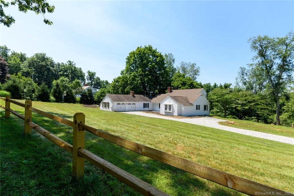 Location, location! This turn key, Cape Cod charmer has been completely renovated to reflect the wish list for today's buyers. White and bright new kitchen with quartz countertops, Wolf range with 6 burners and top of line refrigerator, dishwasher and wine chiller.  The bathrooms have all been redone too. Beautiful quartz vanities, marble floors, showers and tub. Special feature of this home is the first floorprimary bedroom. Spacious and private. Two additional bedrooms and bath on the second level. Plenty of room for entertaining and everyday life in the family room that enjoys a cathedral ceiling and fireplace. The living room and dining room with fireplace look out to the park-like back yard. Riding Club Road is home to multimillion dollar properties and a recent high land sale. #42 has tremendous potential for expansion or can be enjoyed in its newly renovated condition. Hardwood floors throughout the house. New mechanicals too.  Large deck is shaded by a gorgeous older tree and looks on to the beautiful property. Possible pool site or join the Riding Club and walk right over. Not to be missed.