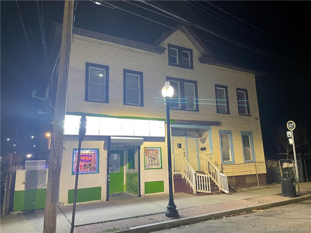 Money maker investment has 5 incomes. 3 blocks from water and has a lot of potential. 3 apartments rented, grocery store rented, restaurant vacant, some appliances and equipment for the restaurant are included in the sale. Owner Broker