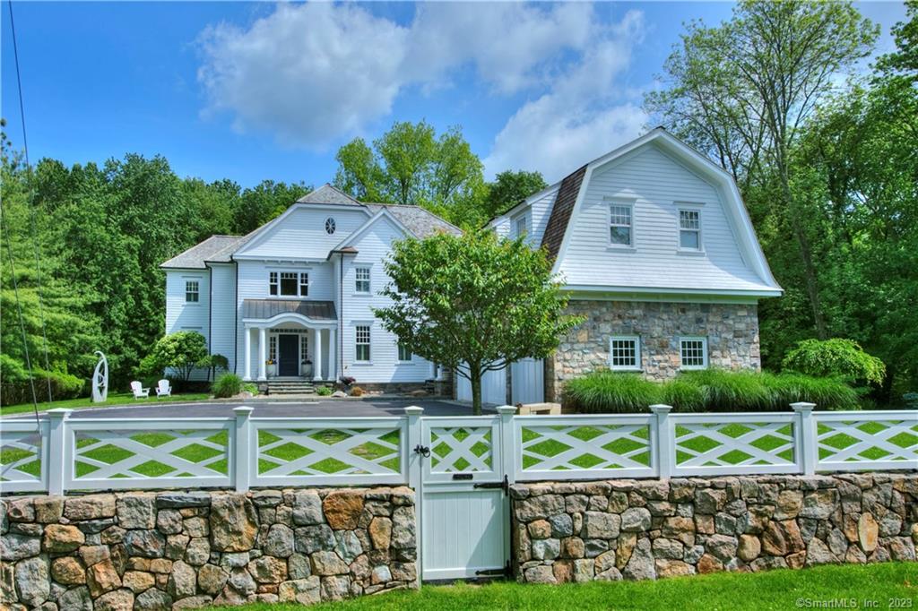 BRAND NEW IN-GROUND POOL at this Walk-to-Compo Beach, Longshore Club Park, Metro North station & Saugatuck Center from this lovely 5+BR Nantucket stone and shingle home, situated in fabulous beach neighborhood (but not in flood zone). Just a stones-throw from the finest area amenities -- swimming, golf, sailing, pickle ball, ice skating, camp programs, tennis, paddle & more. Large formal dining and living room with gas log fireplace, separate library/office and gourmet kitchen with ample breakfast area and adjoining family room with fireplace. Master with gas fireplace plus generously sized family bedrooms and bonus room too. Stone patio with fire pit, ultra-private, fenced yard with rolling lawns, fenced Gunite pool and spa tub overlooking the pretty, natural scenery beyond. 6000 square foot home on two levels, with huge closets, plus storage in walkup attic and enormous dry basement, large mudroom, 3-car garage and full house generator too. Rental includes grounds and sprinkler maintenance, as well as driveway snow removal. Available partially furnished. Shoes off or booties, please.