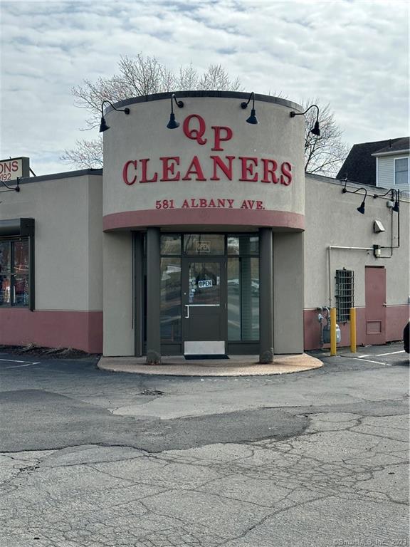 Great Business opportunity. Seller financing may be available. Currently a Dry Cleaning business that offers great income potentially over $25, 000 per month. With a Brand new Hydrocarbon Washer Dryer 40 lbs being installed, as well as a new conveyor, and other high tech valuable equipments already in building. With lots of parking and on a corner lot, this business is in a perfect location. The Front part of building can be used for selling of products or goods, doing tailoring etc, use your imagination.. think profit profit profit. With a nice waiting area and bathroom, this currently operational business is ready for you to purchase and continue making great income. Roof less than 3 years old.Adjacent lot is for sale separately but can be sold as a package deal with dry cleaners.