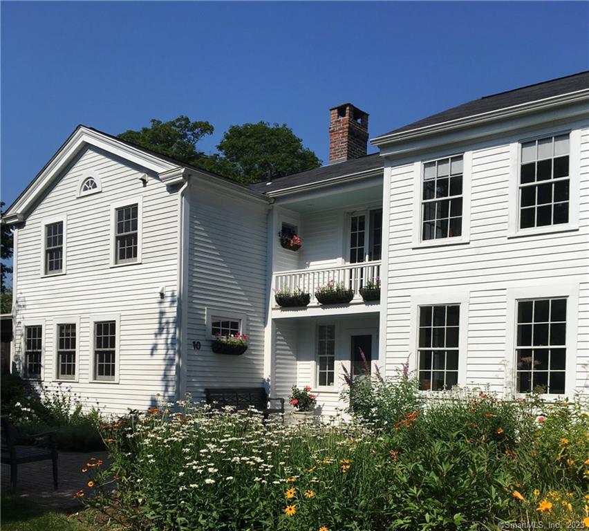 The Perfect Summer Retreat, halfway between NY and Boston, and in an area that enjoys great natural beauty. This Pristine Antique is located in the heart of Old Lyme Village and enjoys views of the iconic,  famously photographed, Congregational Church. Drenched in sunlight and furnished in a sophisticated contemporary style, the floorplan of this home is ideal for work and play. Large gourmet Kitchen, 2 Separate Living Spaces with 3 Bedrooms, 3 Full and 1 Half Baths. There is an Office Space on the 2nd Floor as well as a detached studio to get away and work in quiet separate from the Main House. The outdoors is especially tranquil and private and includes a meditation garden. This rental is for a maximum of 4 persons looking to secure the entire 3-month term from June 1 - August 31 or can be negotiated for Memorial Day to Labor Day. All Utilities and services included in the monthly rental price. House is fully equipped...bring your tooth brush, warm-weather gear and enjoy the summer. Old Lyme Town Beach Parking Passes available to tenants. Spend your Summer surrounded by great natural beauty that provides endless outdoor recreational pursuits or just relax on the screened porch and enjoy the quiet of an idyllic New England village.