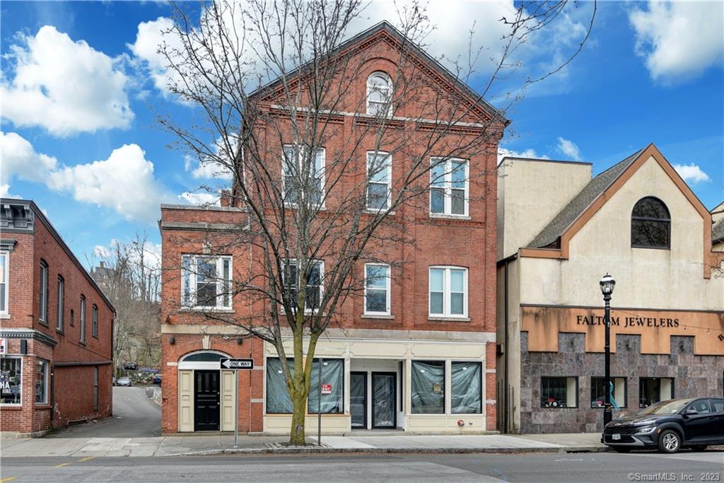 Newly RENOVATED Commercial Building in downtown Naugatuck! Building consists of 6 Residential Units and 2 large commercial spaces on prime main street across from ION Bank headquarters. There are 4 One Bedrooms (approx 609 SF each) and 2 Studio apts (approx 472 each) that are fully leased. Building features NEW windows, NEW roof, NEW electrical and plumbing, NEW heating, handi-cap accessibility, sprinkler system, and more! The commercial/retail space is 2440 SF. Shown by private appointment.