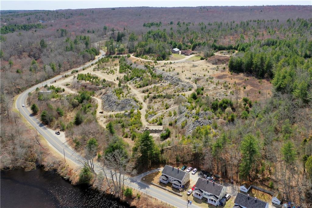 Semi cleared lot just shy of 12 acres with multiple loads of material consisting of sand, gravel, and rock. The current owner has permits in place for the grading plan. Over one thousand feet in road frontage there are many possibilities with this lot in Sterling. Close proximity to Route 14A, Highway 395, and the Rhode Island border. Book your showing today! (Please be aware that the large boulders on lot DO NOT convey with the lot sale.)